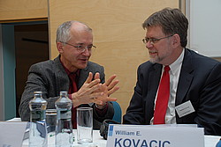 Josef Bejček a William E. Kovacic